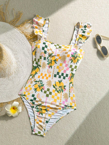 Traje de baño de una pieza con cuello cuadrado, volantes y estampado tropical